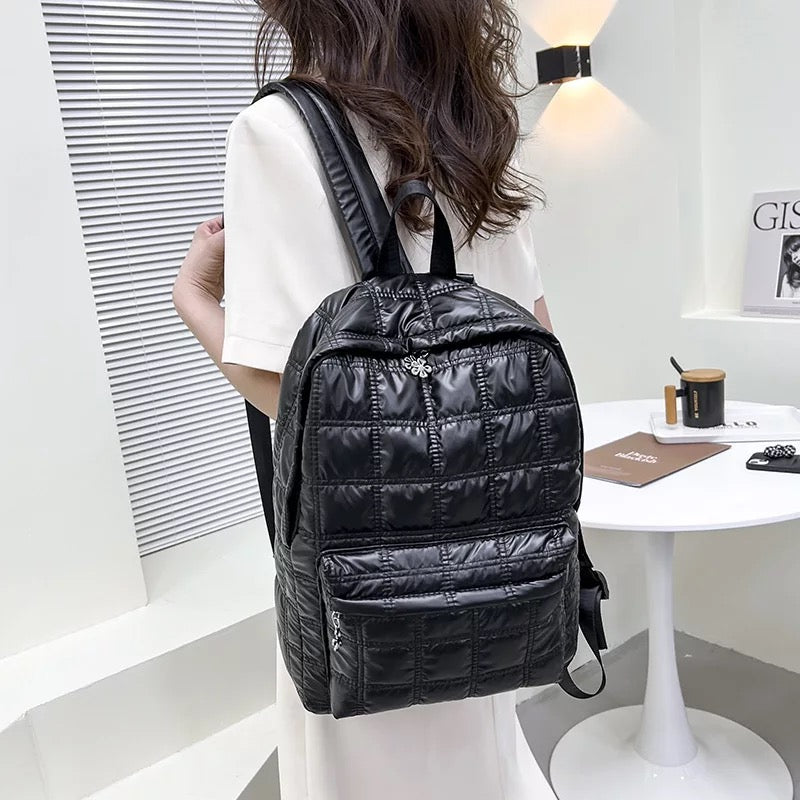 Black puffer outlet backpack